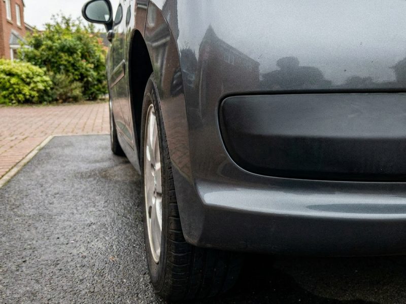 Same bumper corner with clean glossy paint after SMART repair