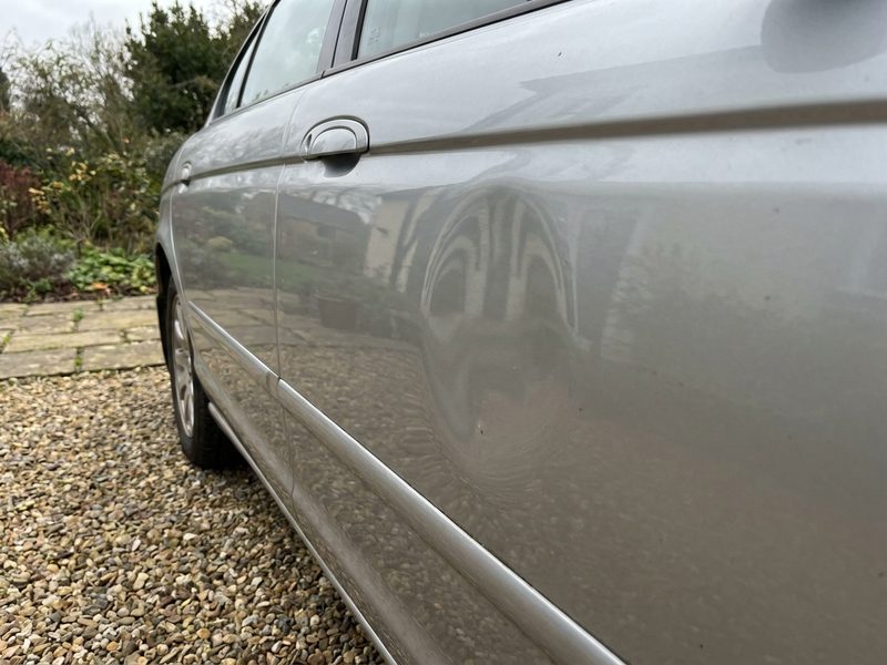 Minor door dent before repair