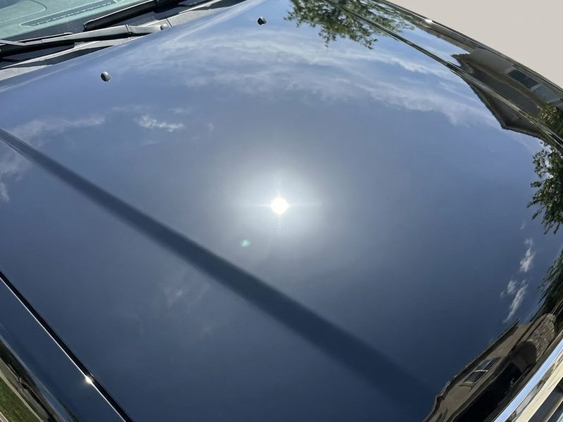 Glossy black paint after machine polishing